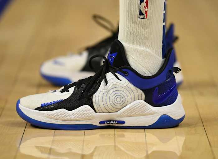 Paul George wearing the Nike PG 5 'Playstation Racer Blue'.
